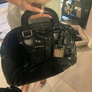 Dolce & Gabanna purse with four types of leather